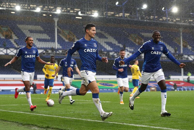 James Rodriguez celebrates after scoring Everton's third goal against Brighton. EPA