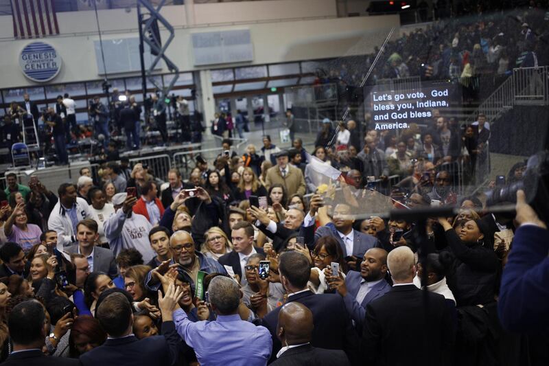 Words reflected in a teleprompter are pictured following the remarks of former President Barack Obama, during a campaign rally with Senator Joe Donnelly, a Democrat from Indiana, in Gary, Indiana. Bloomberg