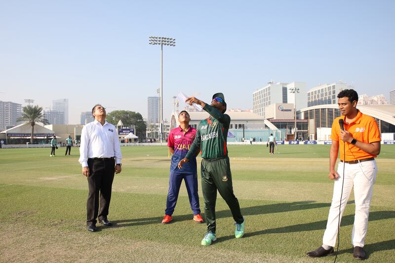 Mahfuzur Rahman, captain of Bangladesh, and UAE skipper Aayan Afzal Khan during the toss.