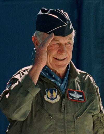 FILE PHOTO: Retired Air Force General Chuck Yeager salutes the crowds gathered at ceremonies honouring the 50th anniversary of his first supersonic flight at Edwards Air Force Base, California, U.S. October 14, 1997.    REUTERS/Sam Mircovich/File Photo