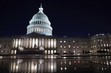 The US Capitol in Washington is seen in the evening hours last week. The Senate continues to debate the latest Covid-19 relief bill. Getty Images