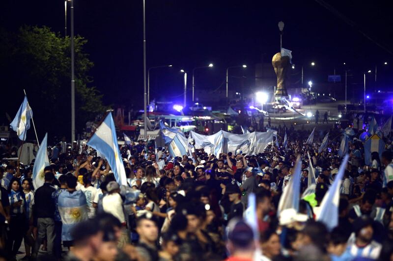 Supporters wait the arrival of Argentina's World Cup winning team at the Argentinian Football Association headquarters. AFP