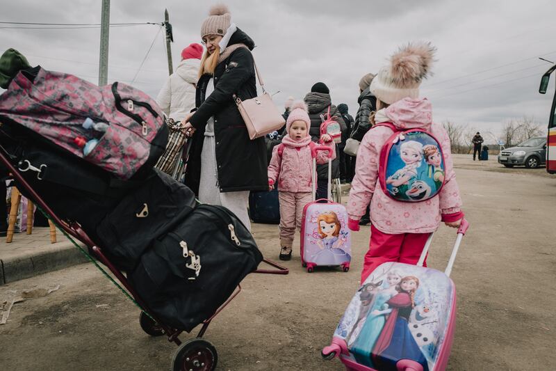 Angelina, 3, and Arina, 5, crossed the border to safety in Moldova with their mother.