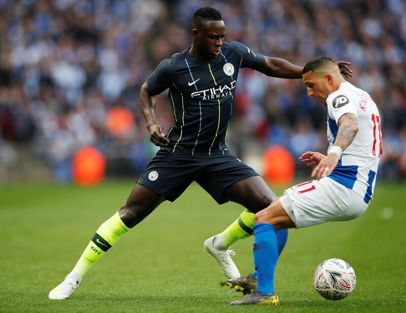 Manchester City's Benjamin Mendy in action with Brighton's Anthony Knockaert. Reuters