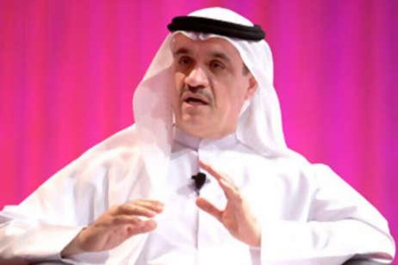 Ahmad Abdulkarim Julfar, Chief Operating Officer of Etisalat, delivers a speech during the Leaders in Dubai Business Forum, Sunday, Nov. 16, 2008, in Dubai, United Arab Emirates. (AP Photo/Nousha Salimi) *** Local Caption ***  XNS109_Emirates_Dubai_Business_Forum.jpg