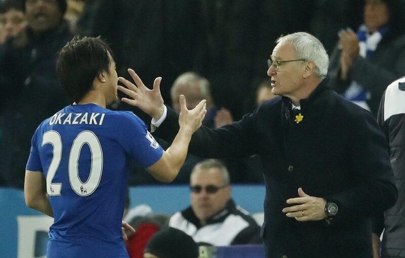 Leicester City manager Claudio Ranieri congratulates Shinji Okazaki as he is substituted. Action Images via Reuters / John Sibley