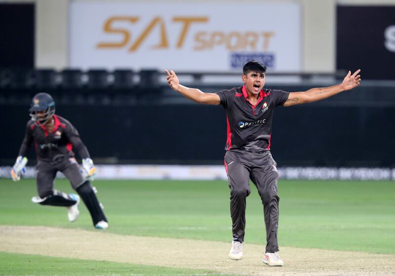 UAE bowler Aryan Lakra successfully appeals for the wicket of Bangladesh's Sabbir Rahman.