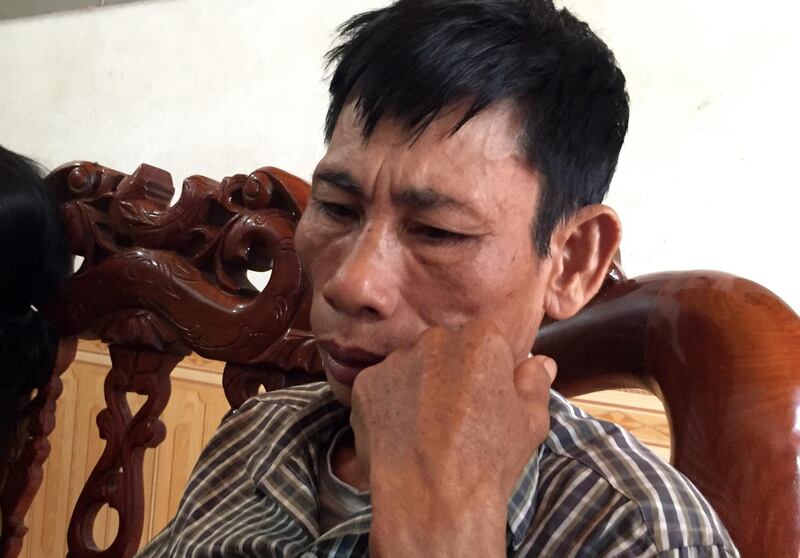 epa07951447 Nguyen Dinh Gia, 57, father of Nguyen Dinh Luong, 20, who is believed to be among the 39 people found dead in a container truck in southeastern England, sits in his home in Can Loc district, Ha Tinh province, Vietnam, 26 October 2019. According to reports, the family believe that Nguyen Dinh Luong was one of 39 people found dead in a lorry in Essex. A total of 39 bodies were discovered inside a lorry container in Grays, Essex in the early hours of 23 October, and pronounced dead at the scene.  EPA/STR