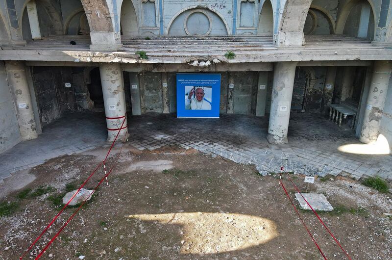 Preparations are under way at the ruins of Al Tahera Church in the Iraq's northern city of Mosul, a day before the arrival of the Pope. AFP