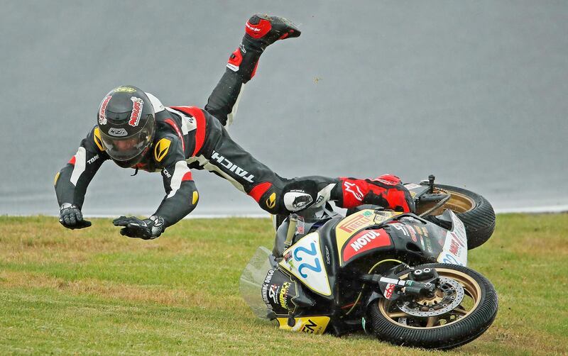 Zackary Johnson of Victoria crashes his Yamaha R6 as he competes in the Australian Supersport Championship - round 1 qualifying session ahead of the 2018 Superbikes at Phillip Island Grand Prix Circuit. Scott Barbour / Getty Images