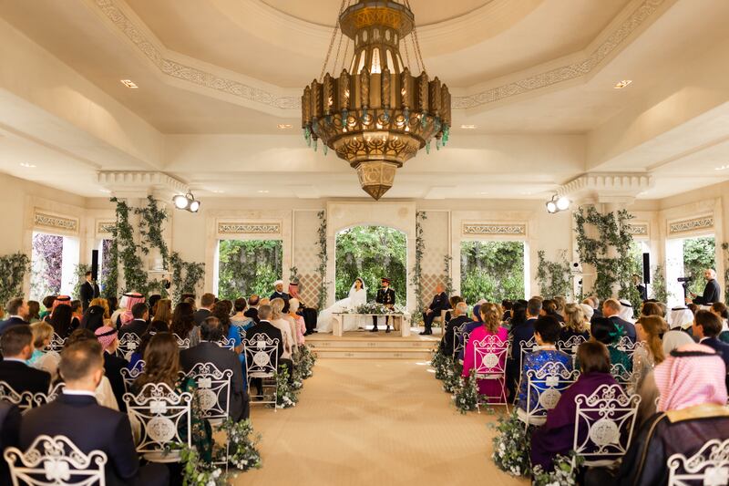 All eyes are on the couple during their wedding. PA