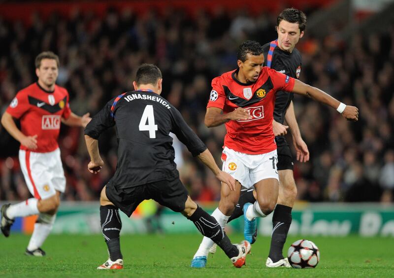 MANCHESTER, UNITED KINGDOM - NOVEMBER 03:  Sergei Ignashevich of CSKA Moscow challenges Nani of Manchester United during the UEFA Champions League Group B match between Manchester United and CSKA Moscow at Old Trafford on November 3, 2009 in Manchester, England. (Photo by Michael Regan/Getty Images)