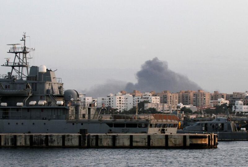 Smoke rises during heavy clashes between rival factions in Tripoli, on May 26, 2017. Reuters