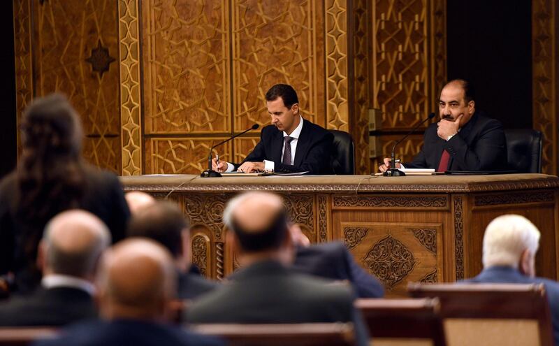epa07077239 A handout photo made available by Syrian Arab News Agency (SANA)  shows Syrian President Bashar Assad (L) chairing a meeting of the Central Committee of al-Baath Arab Socialist Party in Damascus, Syria, 07 October 2018. According to SANA, Assad said the 'Idleb agreement' was a temporary measure through which the state has achieved many gains and foremost stemming bloodshed, noting that this province and other Syrian territory will return to the Syrian state.  EPA/SANA HANDOUT  EPA-EFE/SANA HANDOUT  HANDOUT EDITORIAL USE ONLY/NO SALES