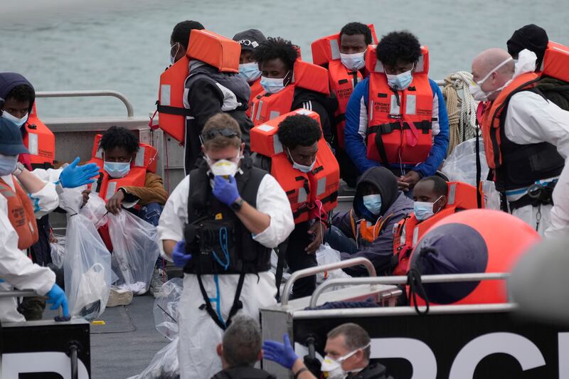 People thought to be migrants who made the crossing from France were picked up in the Channel by a British border force boat in Dover. AP