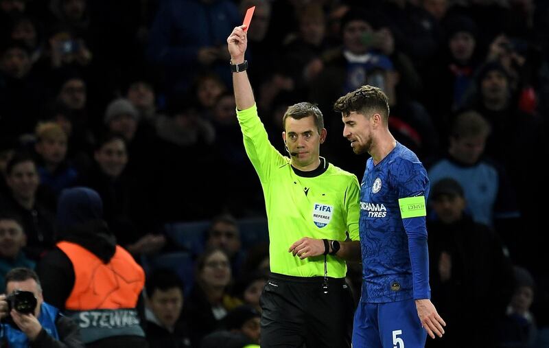 Referee Clement Turpin shows Chelsea's Marcos Alonso (not on the picture) a red card. EPA