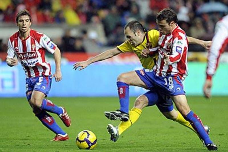 Andres Iniesta, centre, says that Barcelona's youngsters are ready for first team action.