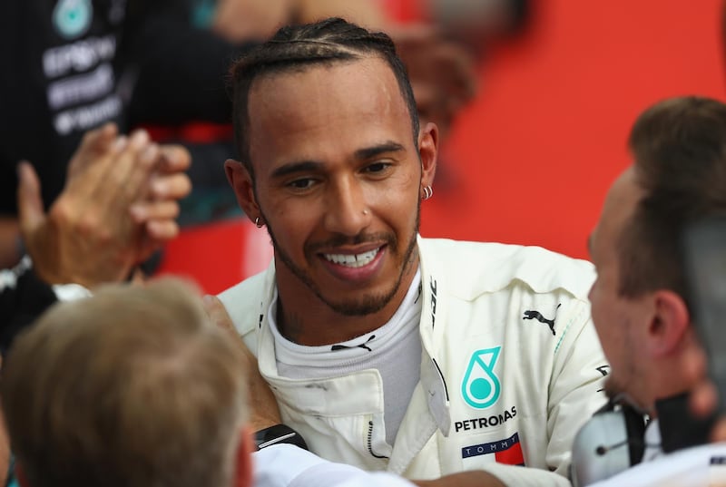 HOCKENHEIM, GERMANY - JULY 22:  Race winner Lewis Hamilton of Great Britain and Mercedes GP celebrates in parc ferme during the Formula One Grand Prix of Germany at Hockenheimring on July 22, 2018 in Hockenheim, Germany.  (Photo by Mark Thompson/Getty Images)
