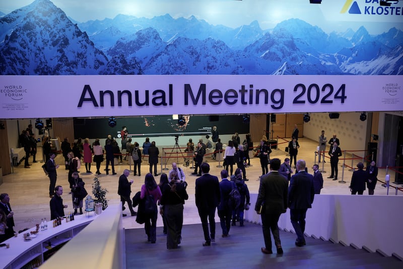 WEF participants gather at Davos Congress Centre. AP Photo