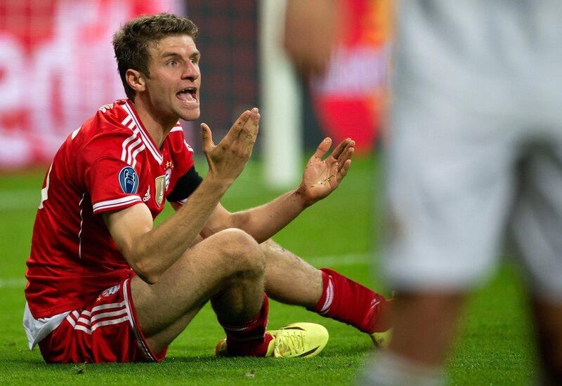 Bayern Munich player Thomas Muller reacts during their Champions League loss to Real Madrid on Tuesday. Sven Hoppe / EPA / April 29, 2014  