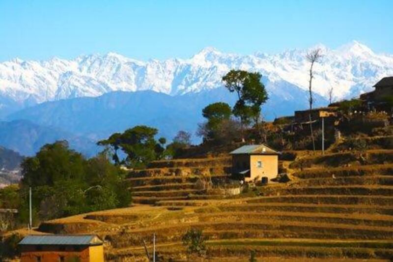 A five-hour uphill hike to Chisapani rewards tourists with spectacular views of mountain ranges and colourful villages. Ashley Lane for The National