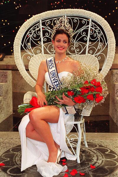 Miss Puerto Rico Dayanara Torres sits on her throne after winning the 1993 Miss Universe pageant in Mexico City on May 22, 1993.    (AP Photo/stf Jeff Robbins)