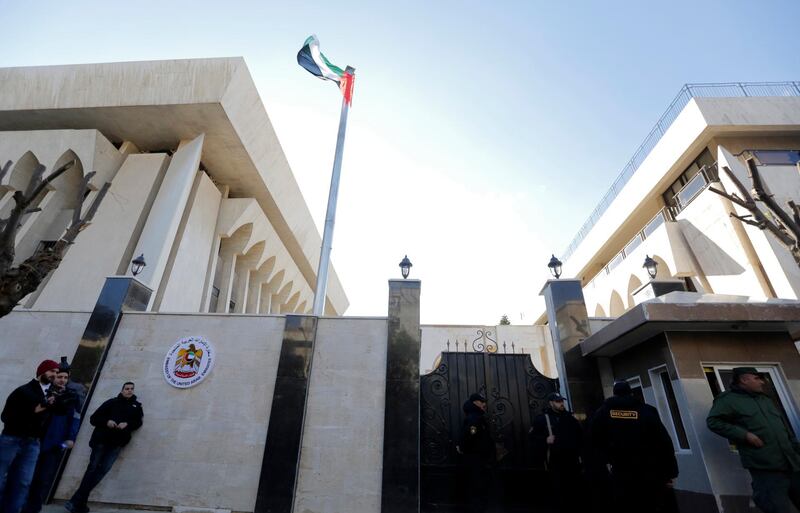 The flag of the UAE flutters atop the embassy building during the inauguration ceremony of the reopening of the embassy in Damascus, Syria. EPA