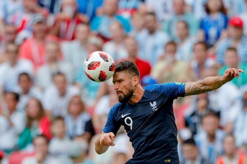 France's Olivier Giroud heads the ball during. Ricardo Mazalan/ AP Photo