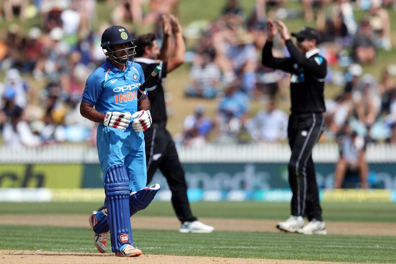 India's Ambati Rayudu (L) is dismissed during the fourth one-day international cricket match between New Zealand and India at Seddon Park in Hamilton on January 31, 2019. / AFP / MICHAEL BRADLEY
