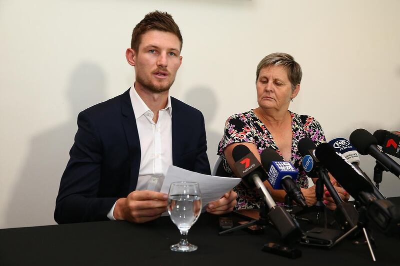 PERTH, AUSTRALIA - MARCH 29:  Australian test Cricket player Cameron Bancroft addresses the media with WACA CEO Christina Matthews at the WACA on March 29, 2018 in Perth, Australia. Bancroft returns home to Perth after being banned by Cricket Australia following his part in the ball tampering scandal in South Africa.  (Photo by Paul Kane/Getty Images)