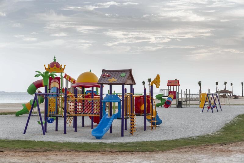 ABU DHABI, UNITED ARAB EMIRATES. 27 MAY 2018. Opening of Hudayriat beach next to Al Bateen beach.
Playground facilities for kids. (Photo: Antonie Robertson/The National) Journalist: Haneen Dajani. Section: National.