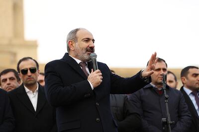 epa09035925 A handout photo made available by the press office of Armenian government shows Armenian Prime Minister Nikol Pashinyan (C) addressing his supporters during a rally in Yerevan, Armenia, 25 February 2021. Pashinyan called on his followers to rally in central Yerevan to support him after he denounced a military coup against him following the army's demanding of his resignation. Pashinyan faced protests with calls to resign after the handling of a six-week conflict between Azerbaijan and Armenian forces over the region of Nagorno-Karabakh in 2020.  EPA/ARMENIAN GOVERNMENT PRESS OFFICE / HANDOUT  HANDOUT EDITORIAL USE ONLY/NO SALES