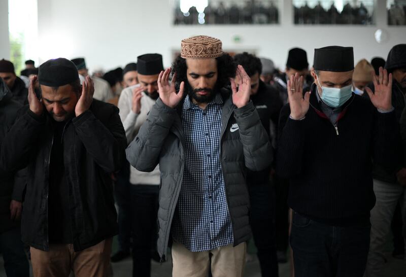 Members of the Ahmadiyya Muslim Community attend Friday prayers at the Baitul Futuh Mosque in Morden, south west London. AFP