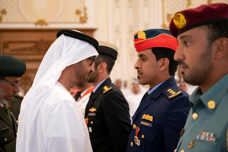 ABU DHABI, UNITED ARAB EMIRATES - April 08, 2019: HH Sheikh Mohamed bin Zayed Al Nahyan, Crown Prince of Abu Dhabi and Deputy Supreme Commander of the UAE Armed Forces (L), presents an Emirates Military Medals to members of the UAE Armed Forces, Ministry of Interior and Abu Dhabi Police, during a Sea Palace barza.

( Ryan Carter / Ministry of Presidential Affairs )
---