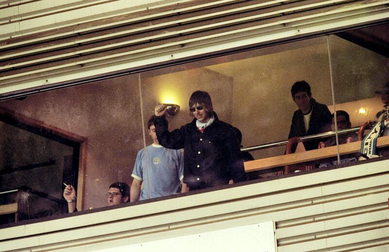 30 May 1999:  Oasis rock star Liam Gallagher a devoted Manchester City fan waves to the crowds during the Nationwide Division Two Play-Off Final match against Gillingham played at Wembley Stadium in London, England.  The match finished in a 2-2 draw after extra-time and in the penalty shoot-out Manchester City won 3-1 and were promoted to Division One. \ Mandatory Credit: Alex Livesey /Allsport