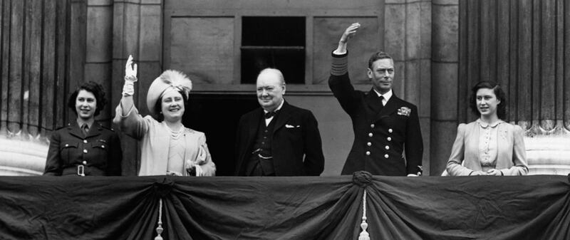 Sir Winston Churchill appears on the balcony at Buckingham Palace together with King George VI and Queen Elizabeth and the two princesses on the afternoon of V-E Day, May 8, 1945. Corbis / Getty Images