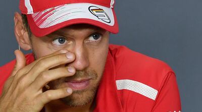 epa06984190 German Formula One driver Sebastian Vettel of Scuderia Ferrari attends a press conference at the Monza racetrack, in Monza, Italy , 30 August 2018. The 2018 Formula One Gran Prix of Italy will take place on 02 September.  EPA/DANIEL DAL ZENNARO