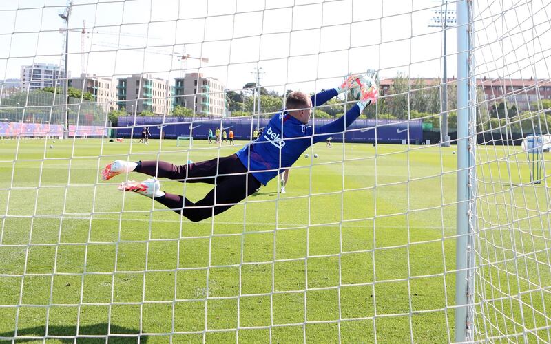 Marc-Andre Ter Stegen saves a shot during a training session at Ciutat Esportiva Joan Gamper. Getty Images