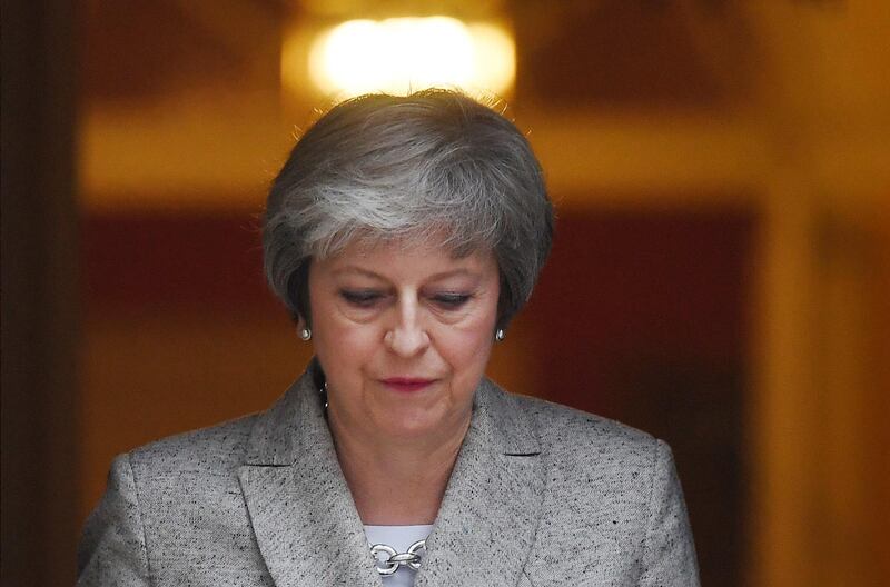 epa07182848 British Prime Minister Theresa May ahead of delivering a statement to the press outside 10 Downing Street in London, Britain, 22 November 2018. May has hailed the EU draft agreement on post-Brexit relations as right for the UK.  EPA/ANDY RAIN