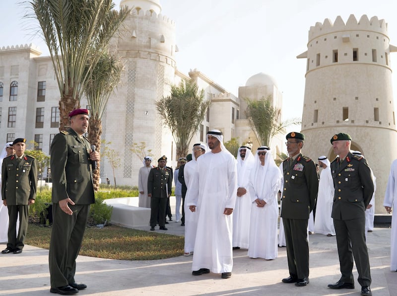 MAHWI, ABU DHABI, UNITED ARAB EMIRATES - September 04, 2019: HH Sheikh Mohamed bin Zayed Al Nahyan, Crown Prince of Abu Dhabi and Deputy Supreme Commander of the UAE Armed Forces (C), inaugurates the Presidential Guard Martyrs Park, at Mahwi Military Camp. Seen with Major General Mike Hindmarsh, Commander of the UAE Presidential Guard (R), HE Lt General Hamad Thani Al Romaithi, Chief of Staff UAE Armed Forces (2nd R), HH Sheikh Hazza bin Zayed Al Nahyan, Vice Chairman of the Abu Dhabi Executive Council (3rd R) and HE Mohamed Ahmad Al Bowardi, UAE Minister of State for Defence Affairs (4th R).

( Hamad Al Kaabi / Ministry of Presidential Affairs )​
---