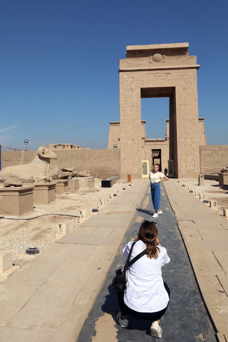 Tourists visit the Karnak Temple complex.