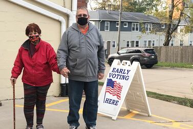 Early voting in Iowa on Friday. AP