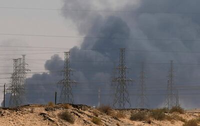 FILE PHOTO: Smoke is seen following a fire at an Aramco factory in Abqaiq, Saudi Arabia, September 14, 2019. REUTERS/Stringer/File Photo