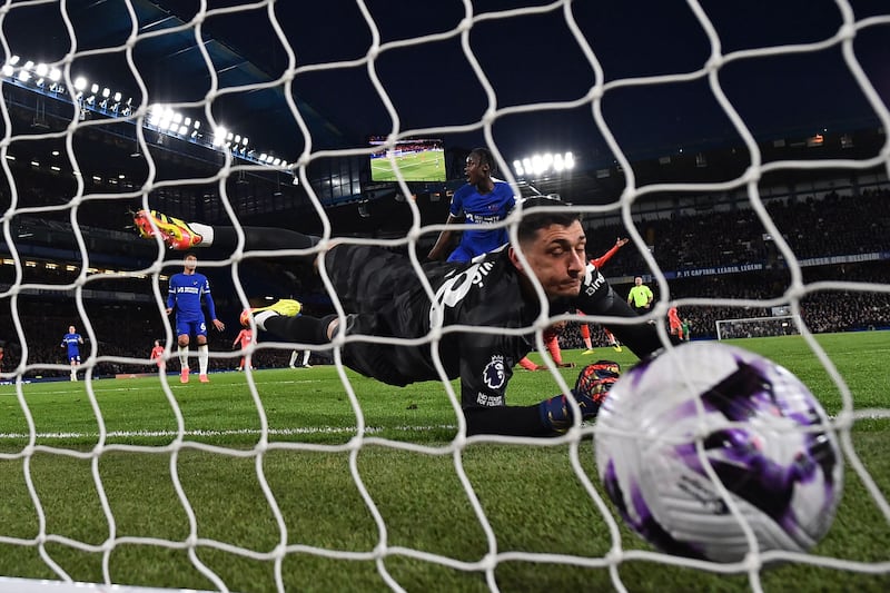 CHELSEA RATINGS: Faced one shot on target in first half, an easy save from weak Beto shot. Beaten by Beto header but Everton attacker was offside. Next save did not come until injury time with deflected shot. AFP
