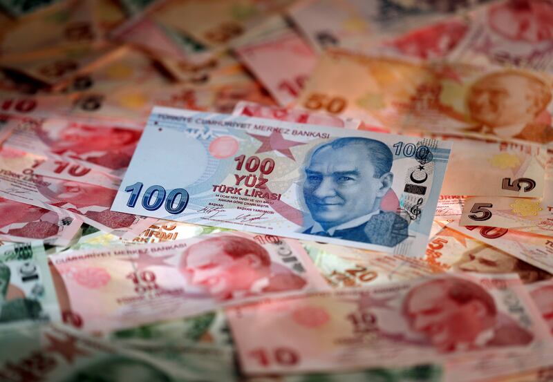 FILE PHOTO: FILE PHOTO: Turkish Lira banknotes are seen in this October 10, 2017 picture illustration. REUTERS/Murad Sezer/File Photo/File Photo