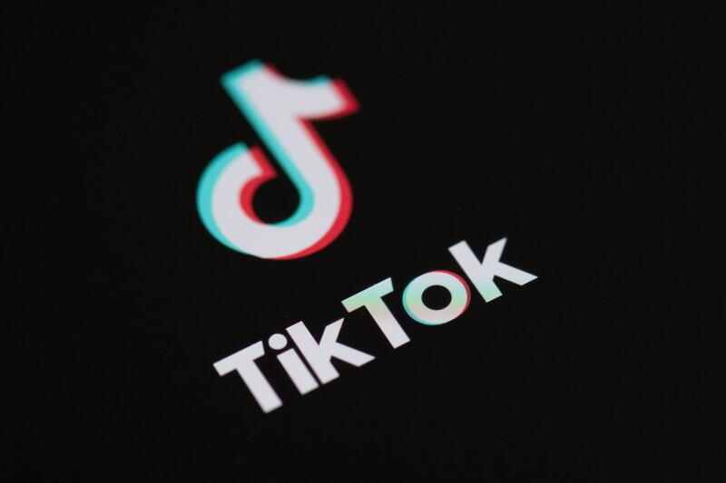 (FILES) This file illustration photo taken on May 27, 2020 This illustration picture shows the logo of the social network  application Tik Tok on the screen of a phone. US President Donald Trump said on July 31, 2020 that he planned to bar the the fast-growing Chinese-owned social media app TikTok from operating in the United States. / AFP / Martin BUREAU
