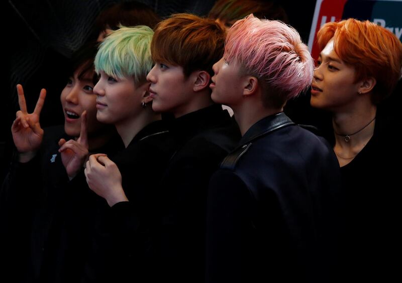 FILE PHOTO: Members of South Korean K-Pop band BTS react on the red carpet during 2015 Mnet Asian Music Awards (MAMA) in Hong Kong, China, December 2, 2015. REUTERS/Bobby Yip/File Photo