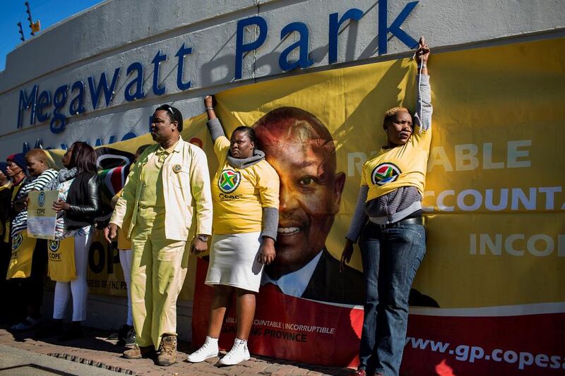 Protesters outside state-owned company Eskom demonstrate against the reinstatement of Brian Molefe as its chief executive. Gulshan Khan / AFP