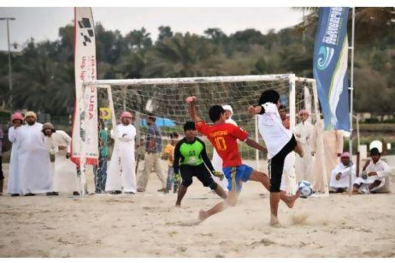 Action from the junior beach football competition at the Al Gharbia Watersports Festival. Region Planning and Inhabitants Relations were the winners of that event.