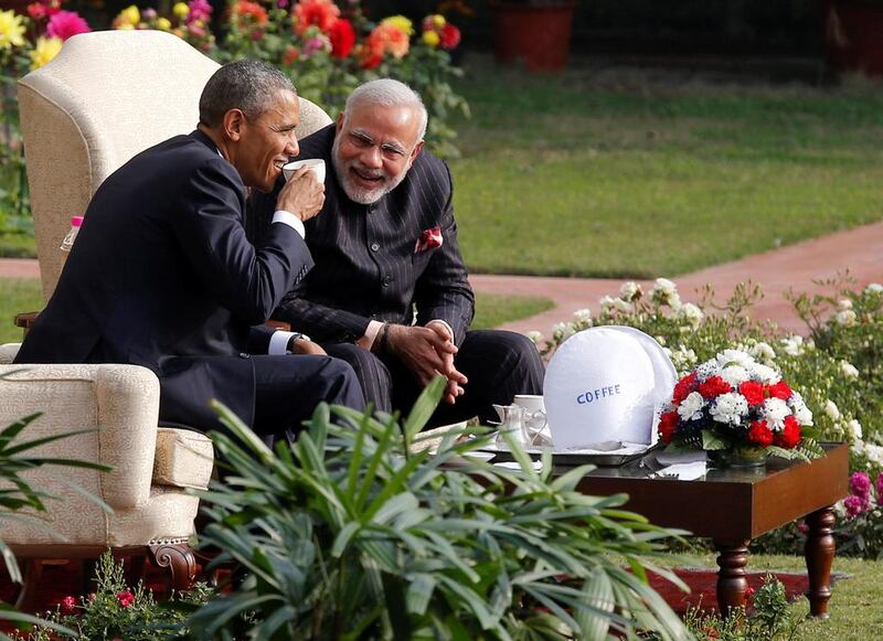 US president Barack Obama and India's prime minister, Narendra Modi, talk as they have coffee and tea together in the gardens of Hyderabad House, New Delhi, on January 25, 2015. Jim Bourg/File Photo/Reuters